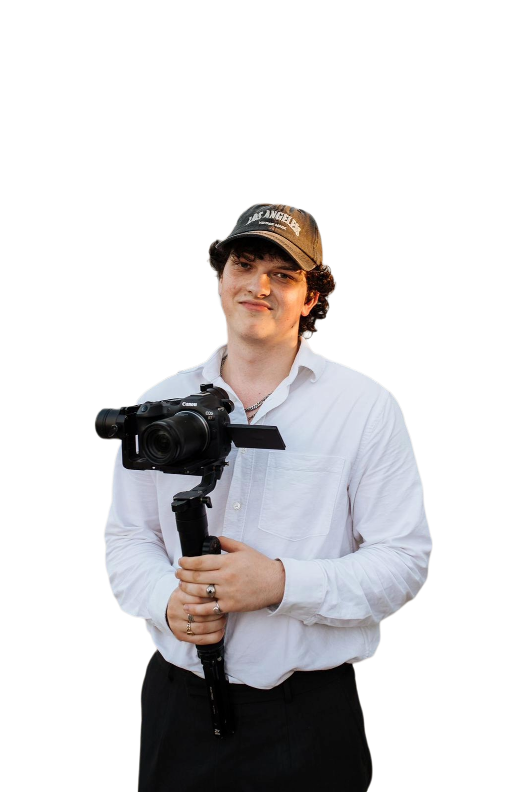 Haralds Baltmuguris holding a camera